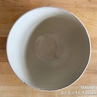 Interior and rim view of yellow ware mixing bowl