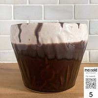 Front view of brown drip glaze stoneware jardiniere planter