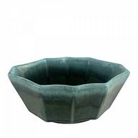 Top angled view showing overall form, glaze colour, decagon rim