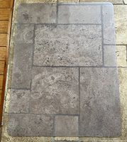 Full view of rectangular clear mat on tile floor