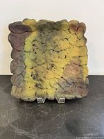 Front view of square pinch platter showing overall form and glaze