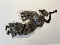 Full view of the plasma-cut steel angel wall sculpture