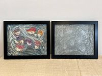 Both framed pieces side by side showing coloured print and steel plate