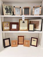 All frames displayed on shelving showing variety of materials and sizes