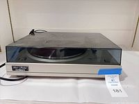 Front view of Fisher MT-6118 turntable with dust cover closed showing overall condition