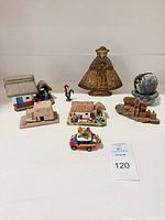 All eight folk art miniatures grouped together