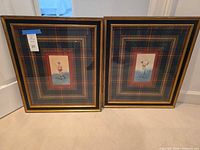 Front view of both framed prints showing frames, mats and artwork