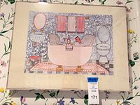 Full view of framed lithograph on wall