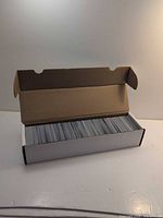 Open 800-count storage box filled with cards