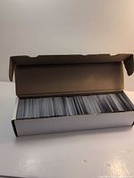 Open 800-count storage box filled with trading cards