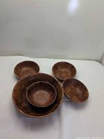 Full set showing one large and four small bowls