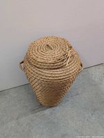 Full view of wicker basket with lid on