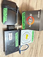 All four items: router with adapter, AMD fan box, external hard drive, DVD-ROM drive