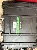 Exterior of Husky tool case with dimensions label visible
