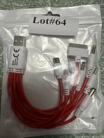 Front of sealed package showing red multi-connector cable