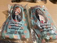 Two sealed McDonald’s Alexander Mickey Mouse dolls in bags, front view