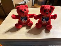 Both red FDNY plush bears front view