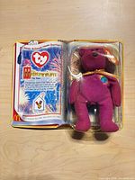 Millennium bear sealed in blister with booklet