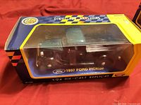 Boxed 1:24 1937 Ford Pickup model, front view