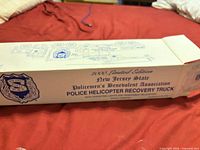 Closed box showing printed model name and association logo