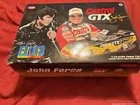 Box top showing product graphics and branding