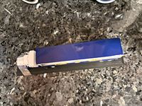 Top view of blue trailer and white cab on display base