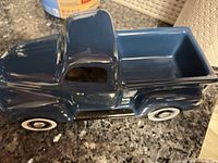 Top view of blue ceramic truck planter showing planting cavity