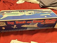 Front of original Hess 1999 Toy Truck and Space Shuttle box