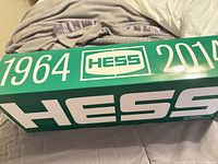 Side of outer box showing Hess logo and years 1964-2014