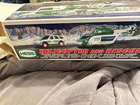 Box lid showing artwork and product name