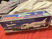 Front of illustrated Hess Toy Truck and Space Shuttle box