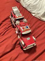 Top three-quarter view of both Hess vehicles linked together