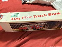 Closed box showing Hess Toy Fire Truck Bank branding