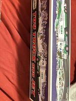 Box side panel showing Hess Toy Truck and Jet artwork