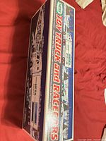 Box top showing Hess Toy Truck and Racers graphics