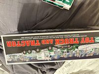 Box top displaying Toy Truck and Tractor branding and artwork