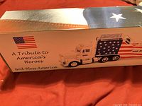 Box side panel showing toy truck and trailer graphics