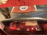 Model in box front view showing truck details and branding