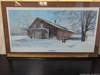 Front view of framed print showing artwork, title, mat and frame with ruler for scale
