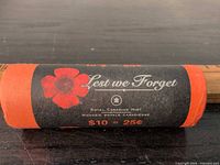 Roll front showing "Lest we Forget" text and poppy graphic