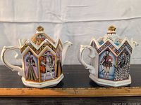 Front views of both Sadler Tudor themed teapots showing designs and form