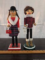 Front view of both nutcracker figurines
