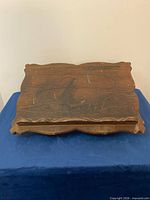 Top view showing carved edges and surface wear