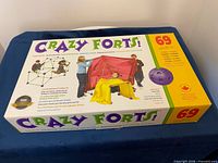 Closed box displaying Crazy Forts branding and 69-piece specification