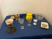 Overall lot showing all items on blue background