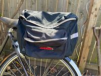 Front view showing Avenir logo, front pocket, reflective strip