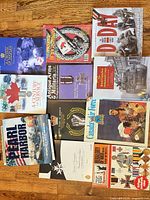 All eleven publications laid out flat, covers visible