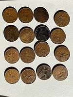 Reverse view of 18 one penny coins showing Britannia design