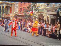 Disneyland parade characters slide projected through viewer