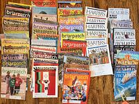 Full lot showing multiple stacks of Briarpatch, Harper's, The Walrus and other magazines
